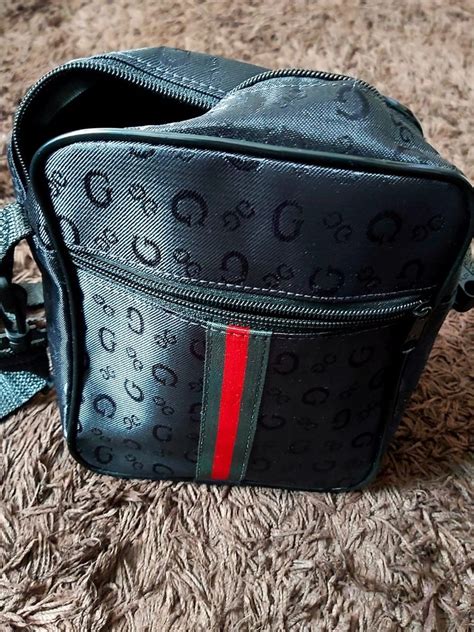 bolsas gucci homem